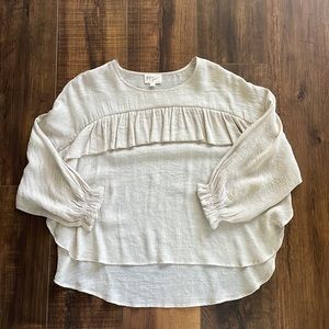 Neutral Tunic blouse with ruffle detail